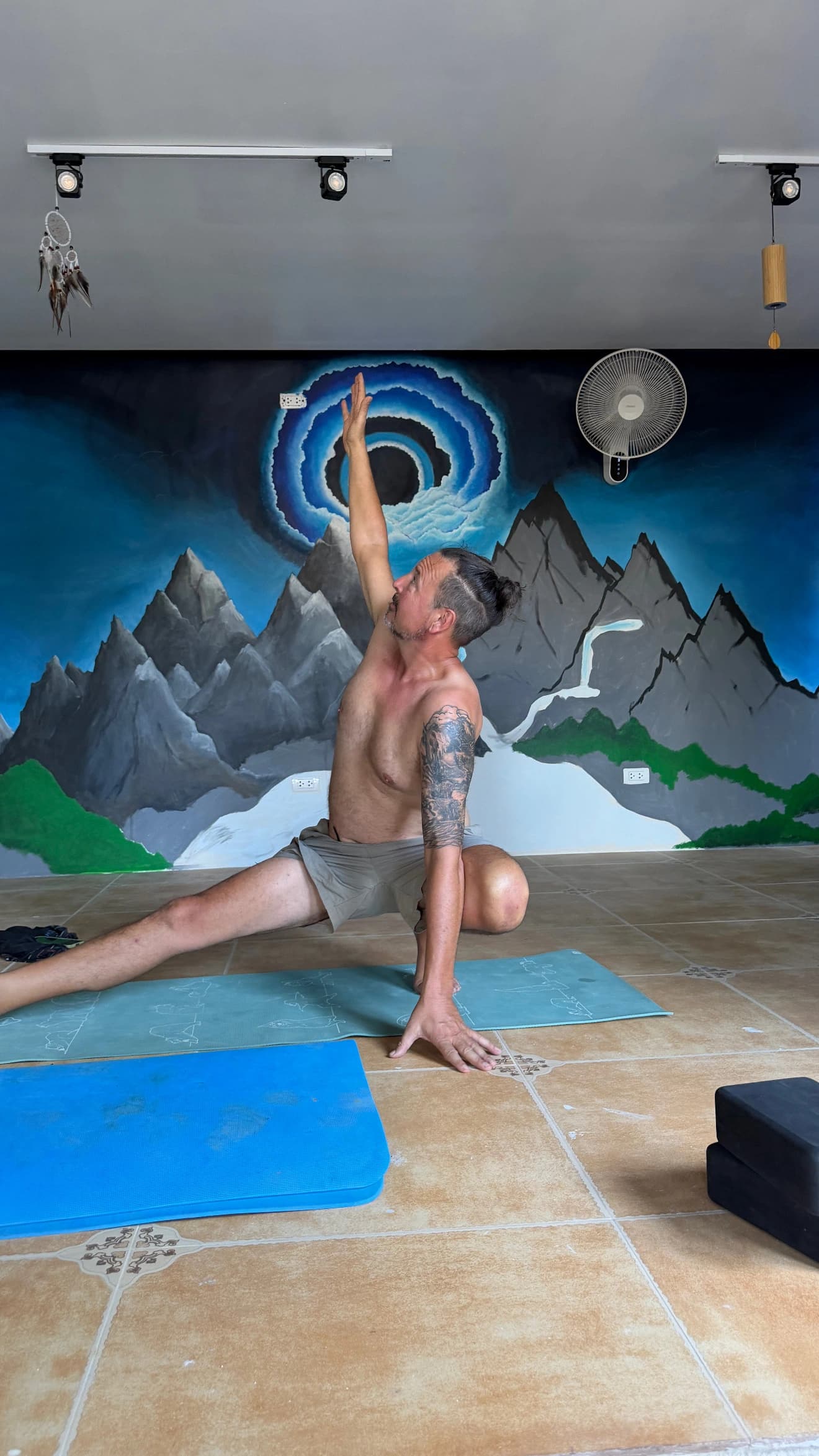 A movement pose in the Zen Pod yoga studio