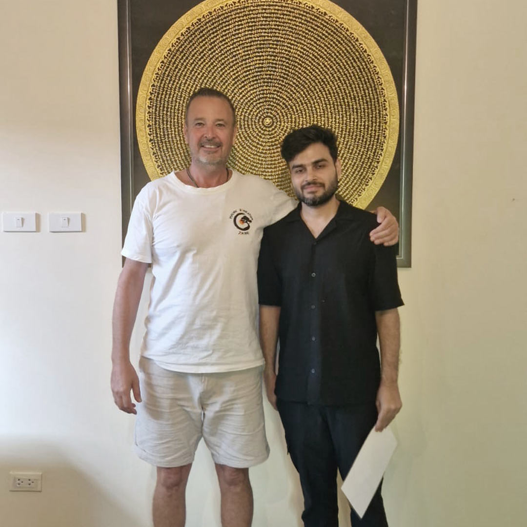 A newly certified Zen Pod breathwork graduate with their certificate